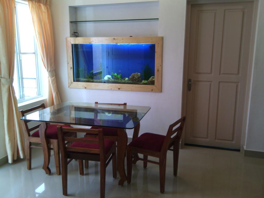 Nathans Holiday Home Kochi Rom bilde